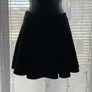 Black pleated skater skirt